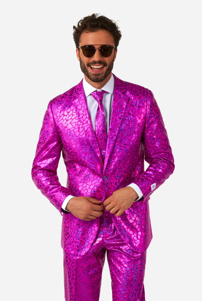 Man wearing shiny pink lizard skin men's suit