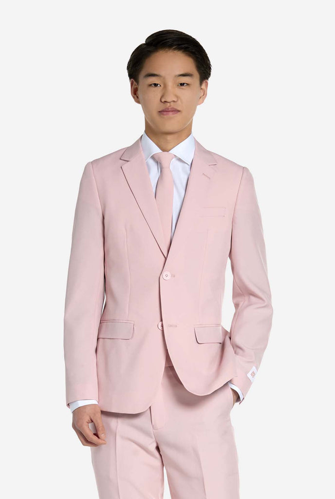 Teen wearing soft pink teen boys suit.