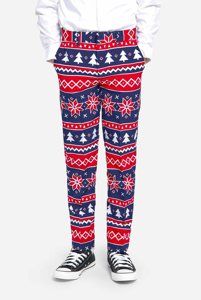 Teen wearing Christmas suit with Nordic print, pants view