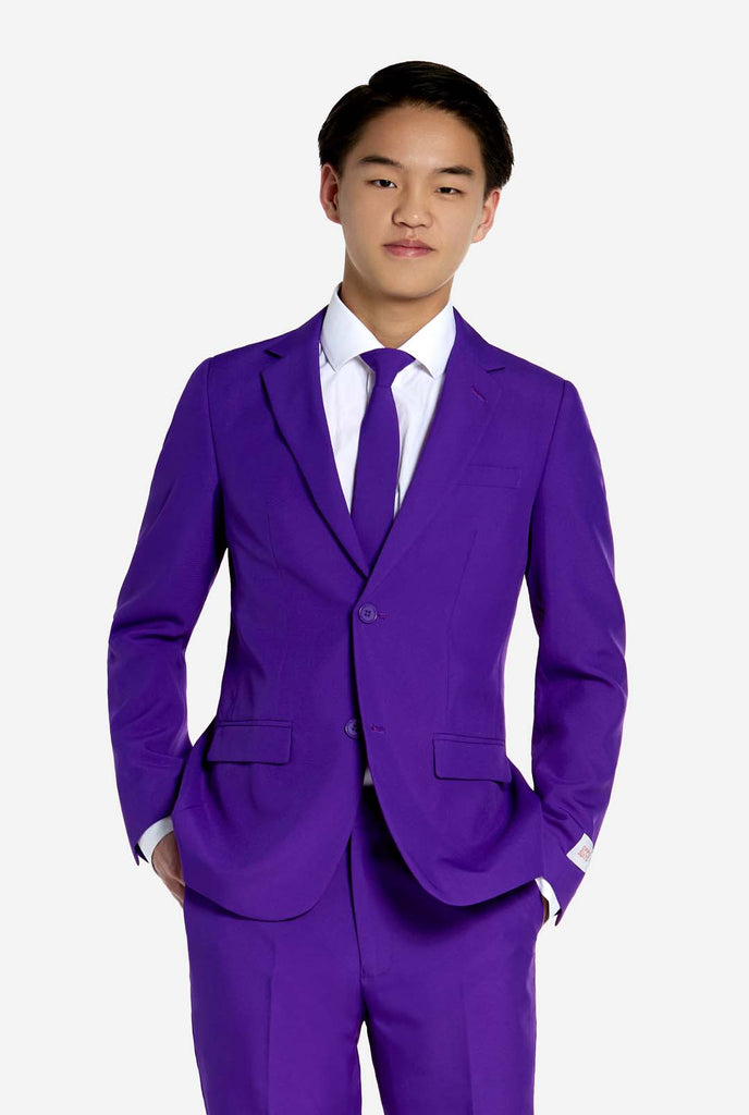 Teen wearing purple teen boys suit.