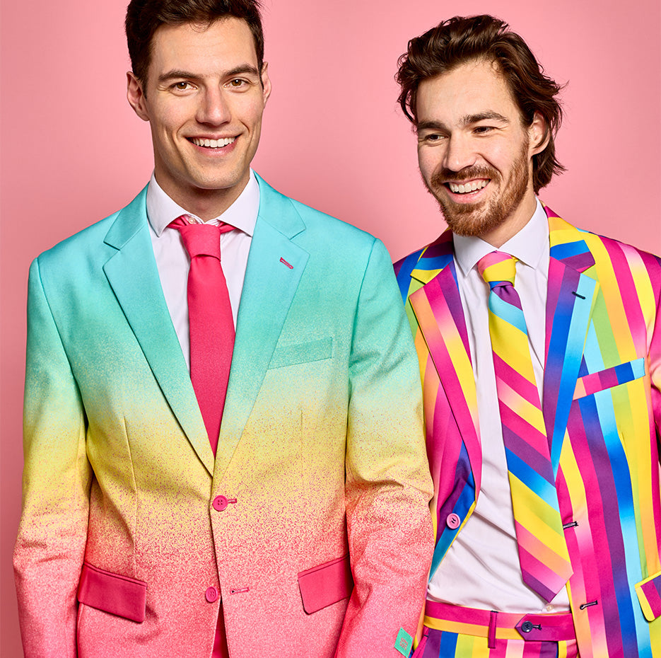 Men wearing rainbow colored Pride suits
