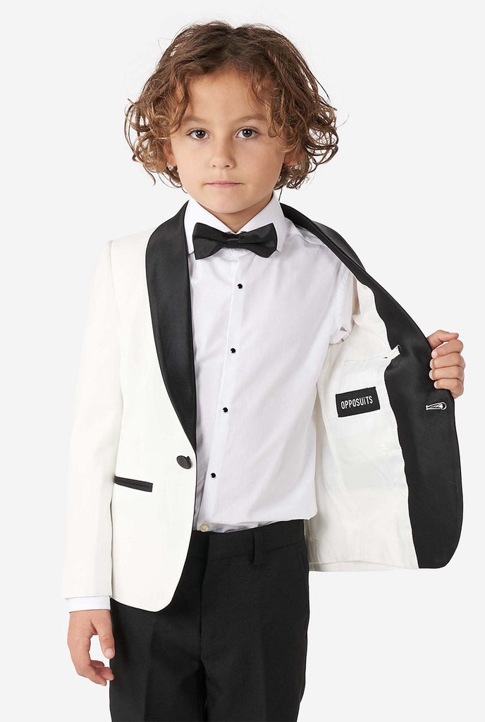 Kid wearing white and black tuxedo