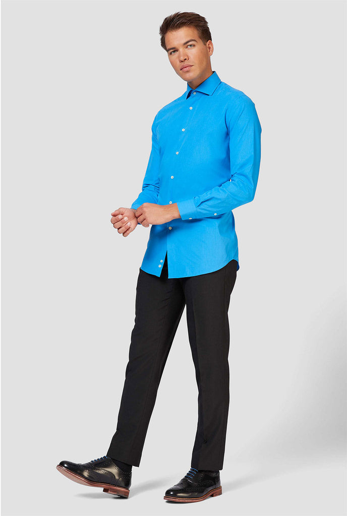 Blue long-sleeve shirt worn by man - close up