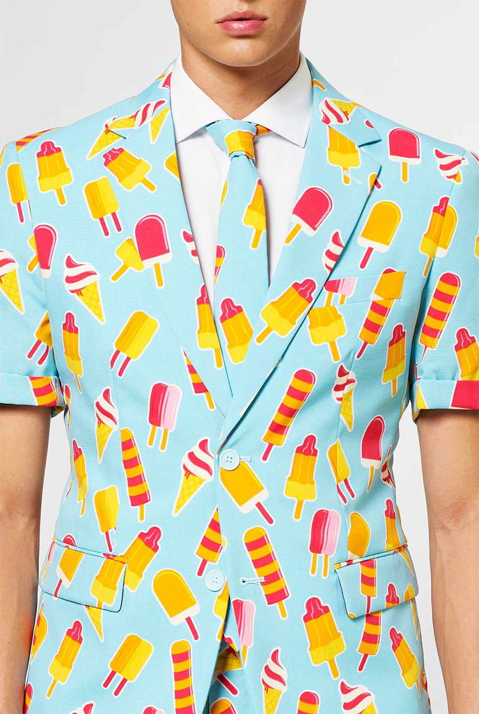 Man wearing light blue summer suit with popsicle print