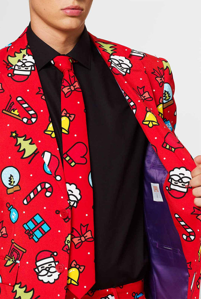 Man wearing red Christmas summer suit with Christmas print