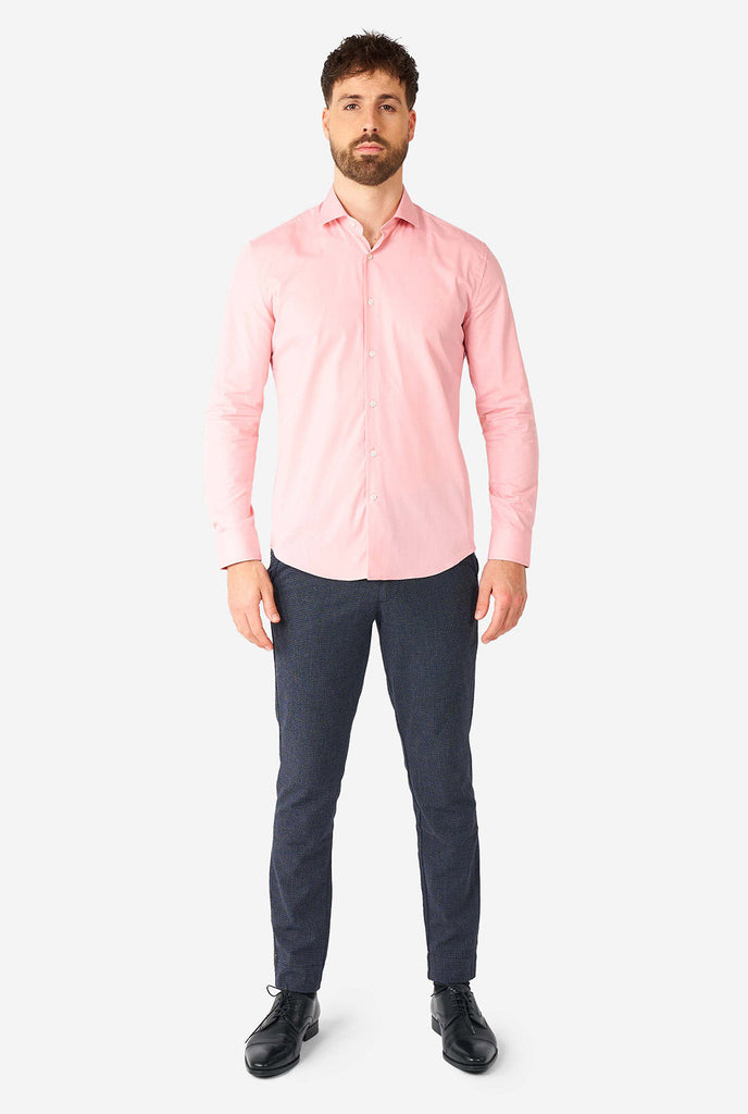 Man wearing soft pink dress shirt