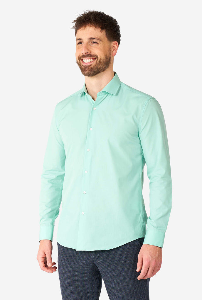 Man wearing mint green dress shirt