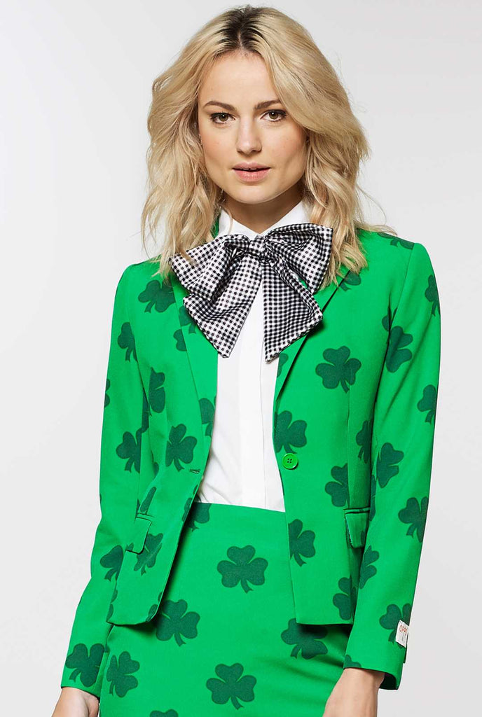 Woman wearing green St. Patrick's Day blazer