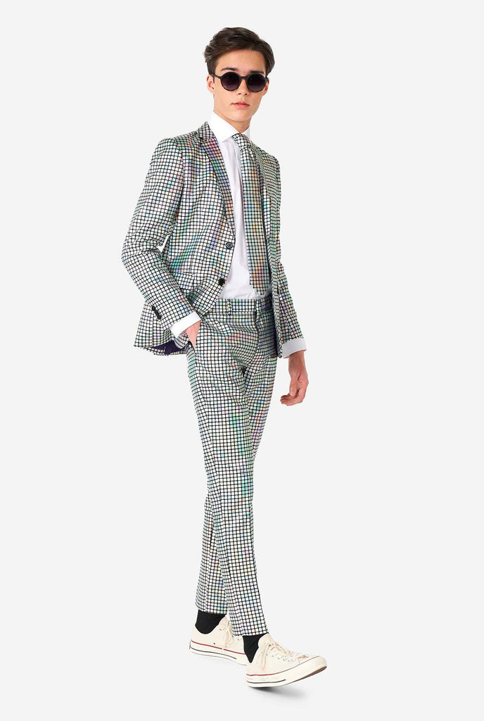 Teen wearing formal suit with mirror discobal print