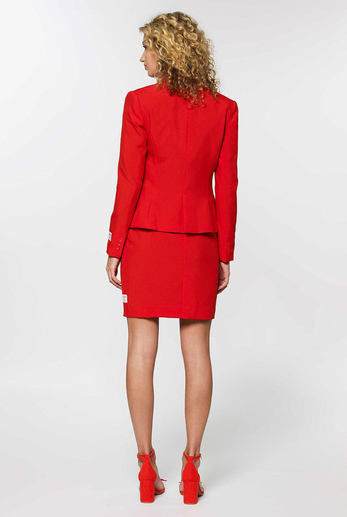 Woman wearing red dress suit