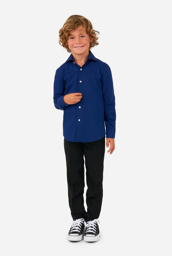 Boy wearing blue dress shirt and black pants