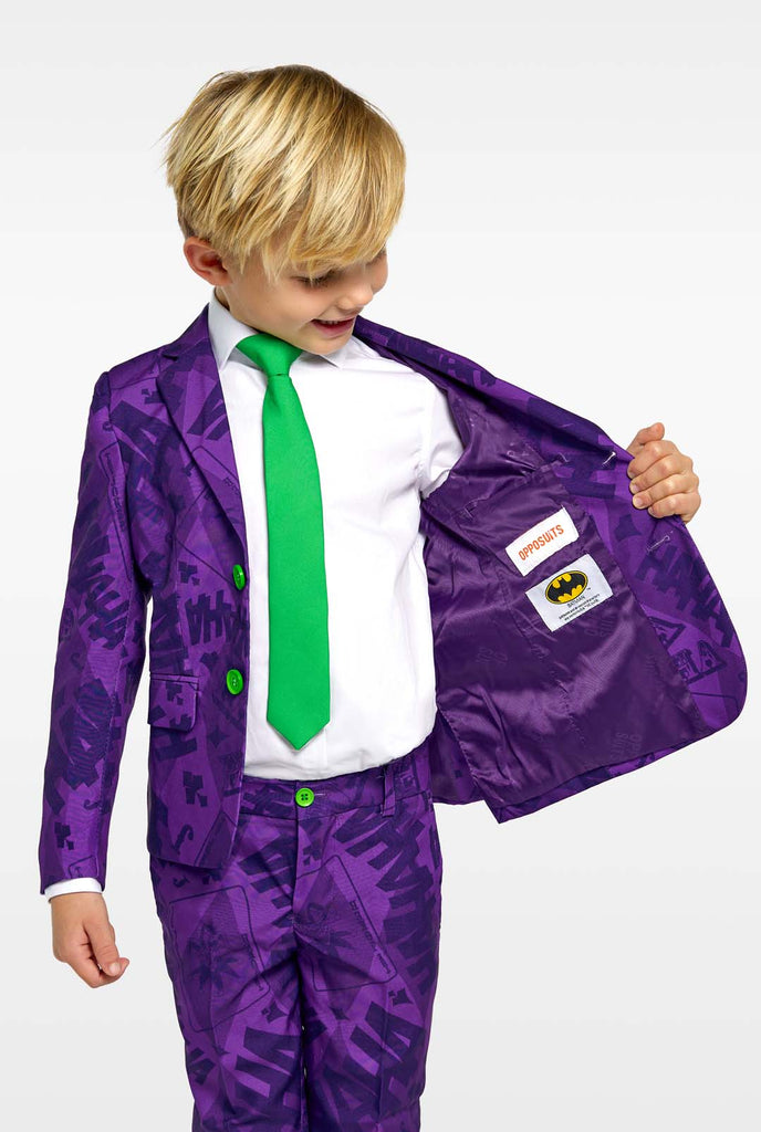 Kid wearing purple boys suits with The Joker Batman theme