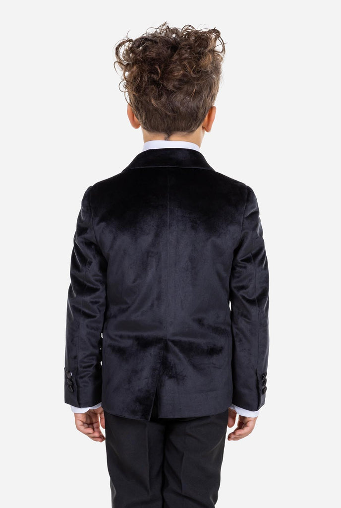 Kid wearing black velvet dinner jacket for boys, view from the back