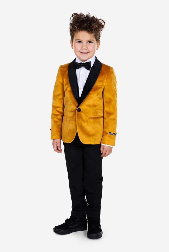 Kid wearing gold velvet dinner jacket for boys