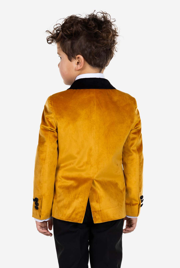 Kid wearing gold velvet dinner jacket for boys, view from the back