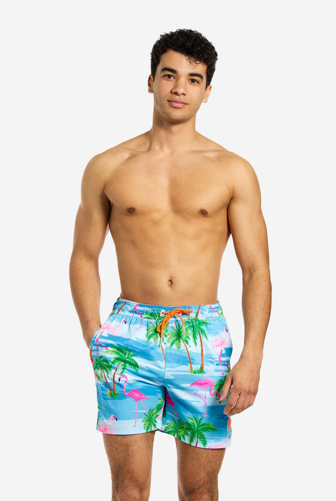 Man wearing Flaminguy swim trunks for men