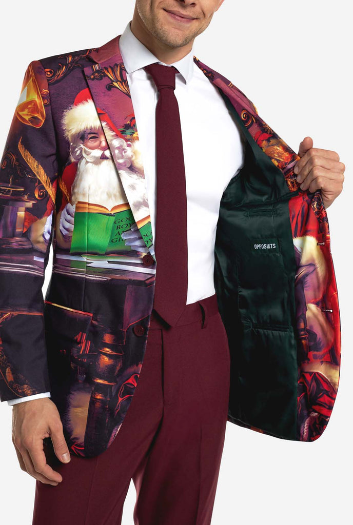 Man wearing burgundy red Christmas suit with vintage Christmas print, close up
