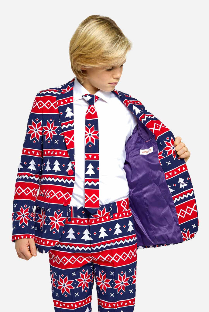Teen wearing Christmas suit with Nordic print