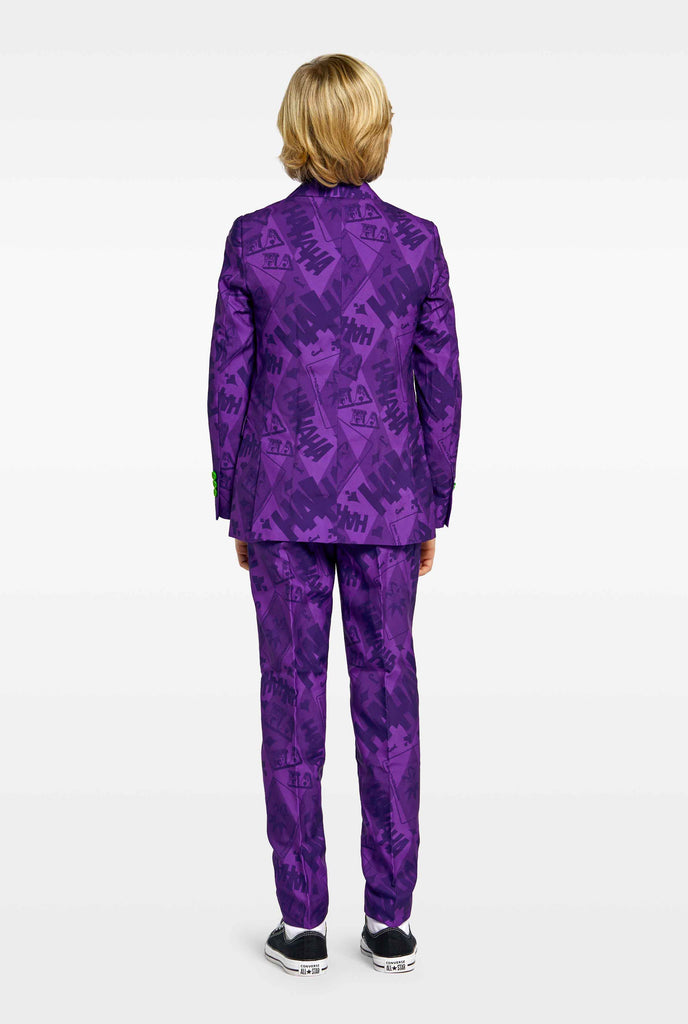 Teen wearing purple boys suits with The Joker Batman theme, view from the back