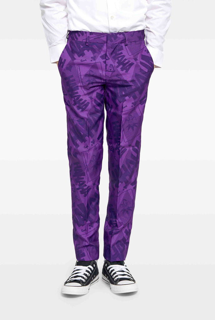 Teen wearing purple boys suits with The Joker Batman theme, pants view