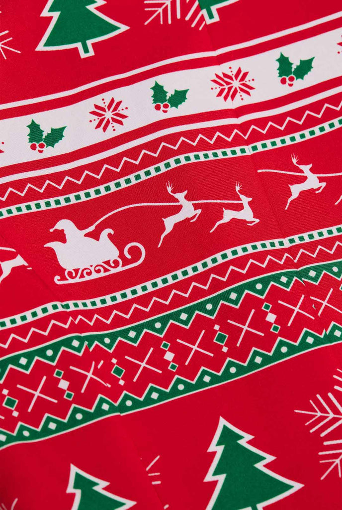 Woman wearing Christmas blazer with Winter print, close up