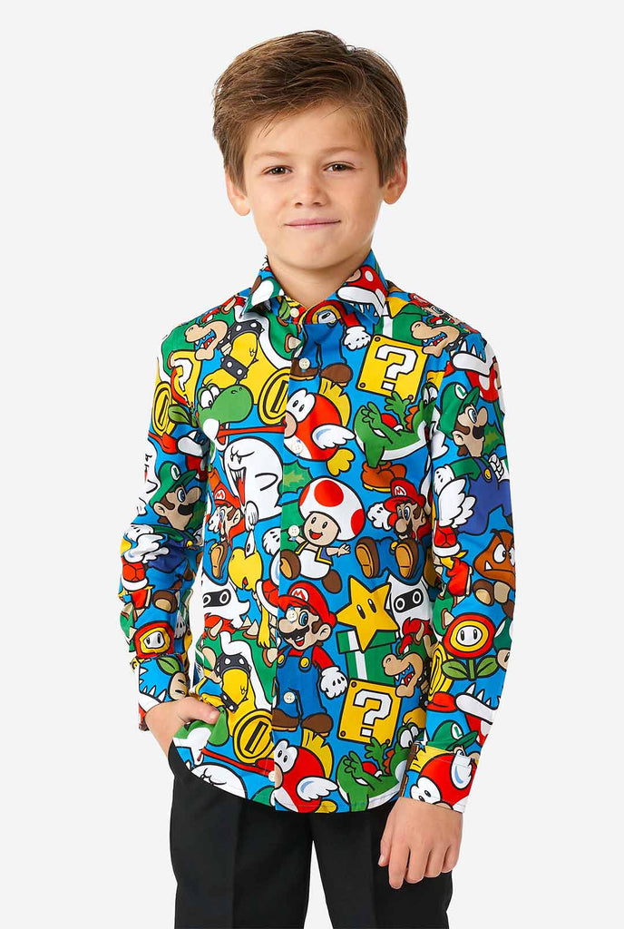 Boy wearing colorful long sleeve shirt with Super Mario Nintendo print