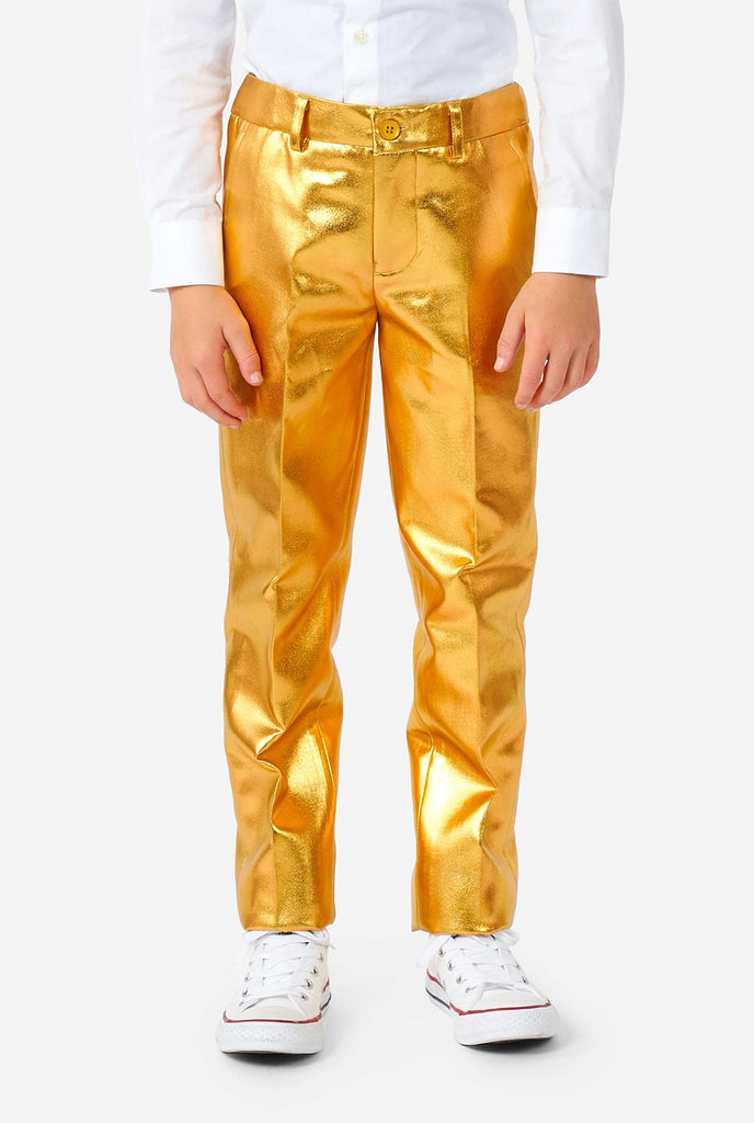 Boy wearing shining gold suit