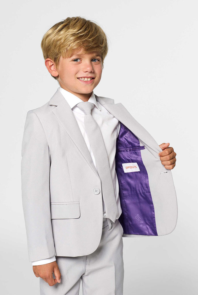Solid color Groovy Grey suit for kids worn by boy
