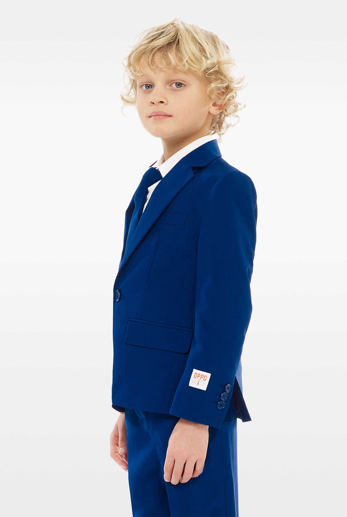 Dark blue suit for boys worn by boy