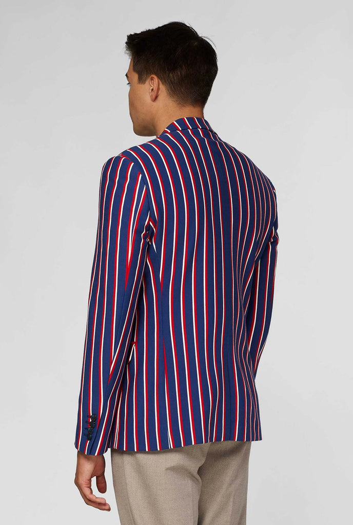 Red white and blue striped casual blazer worn by man