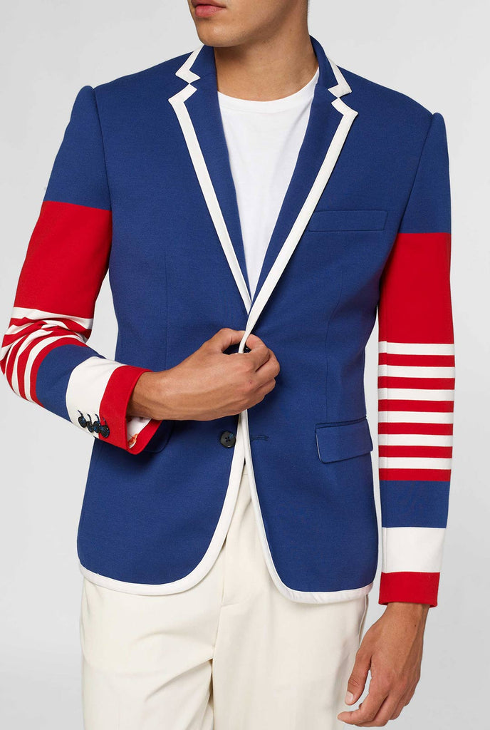 Red white and blue sporty casual blazer worn by man