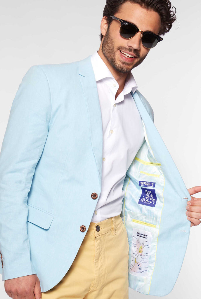 Blue casual blazer with parrot embroidery worn by man