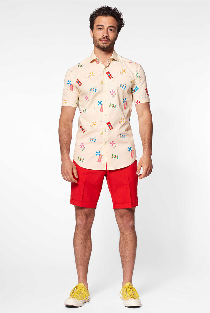 Man wearing summer shirt with beach icons