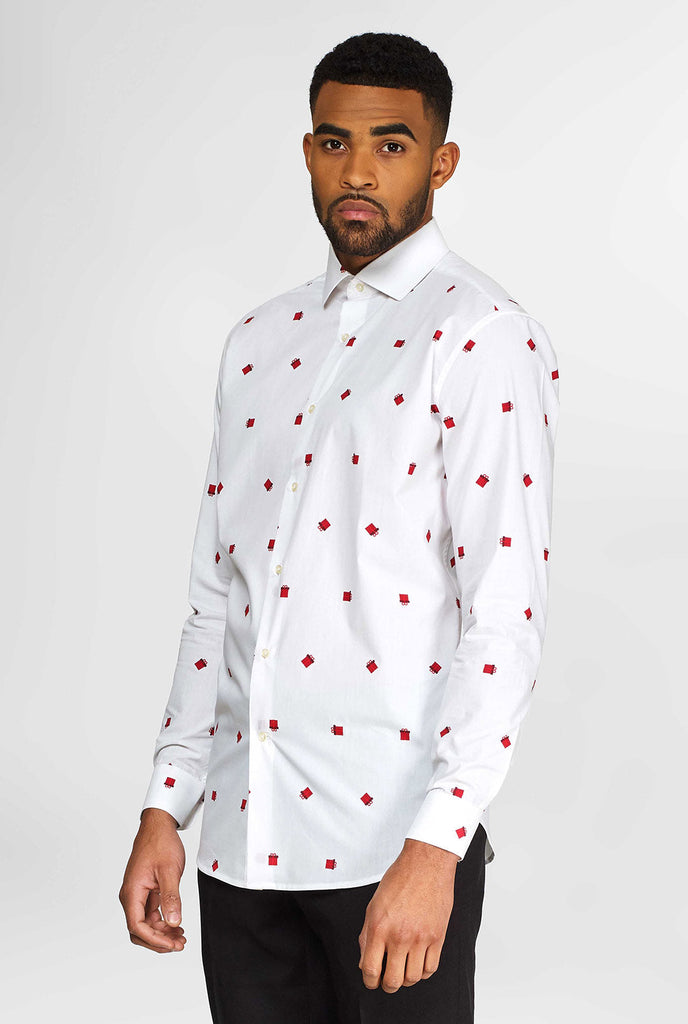 Man wearing white dress shirt with Christmas gift icons