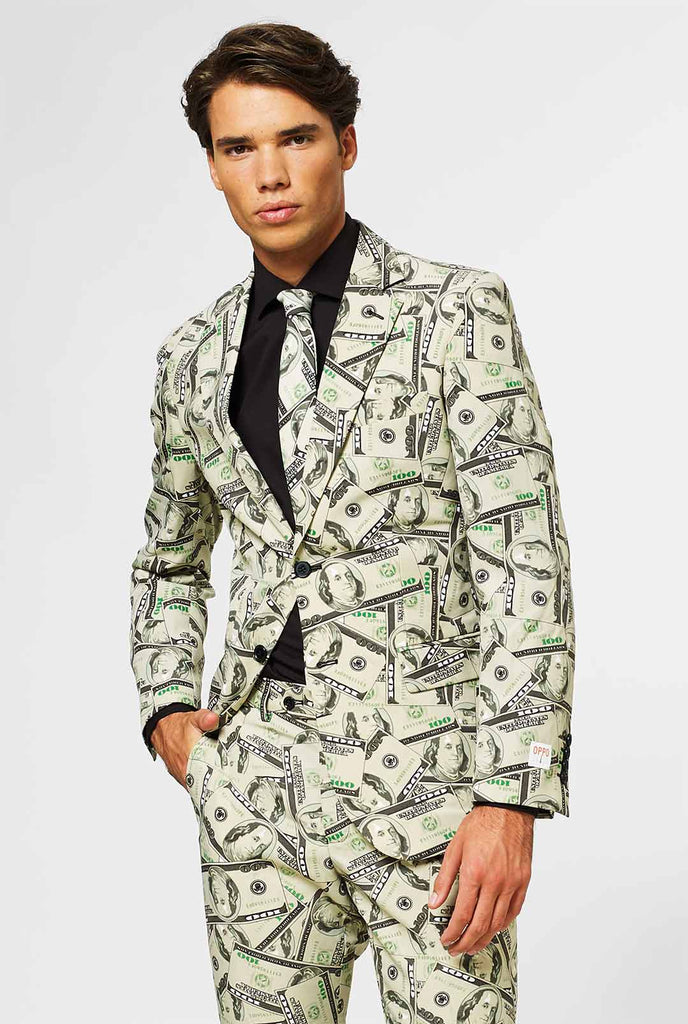 Man wearing men's suit with dollar, money print