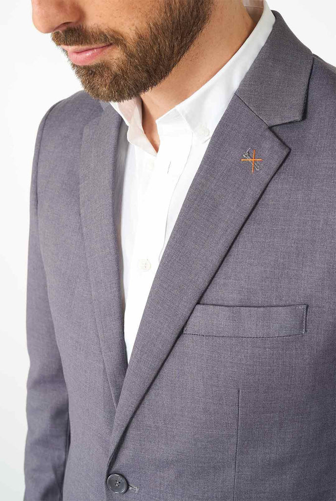 Man wearing casual grey business suit