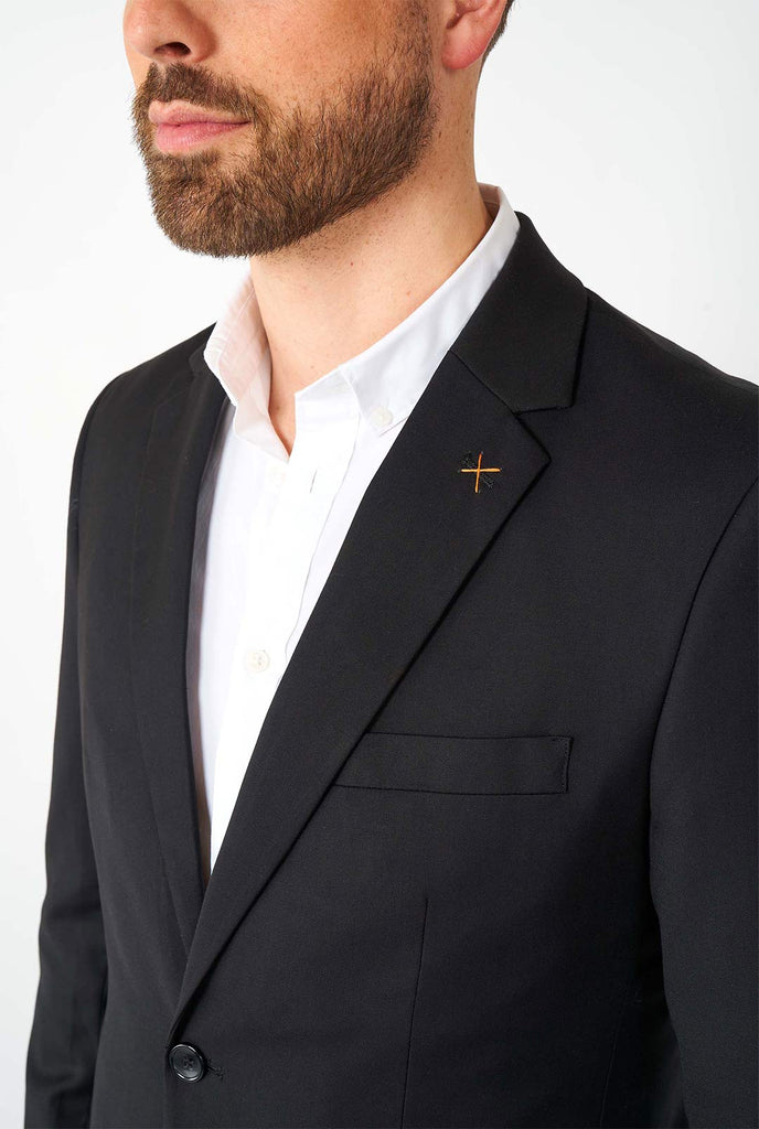 Man wearing casual black business suit