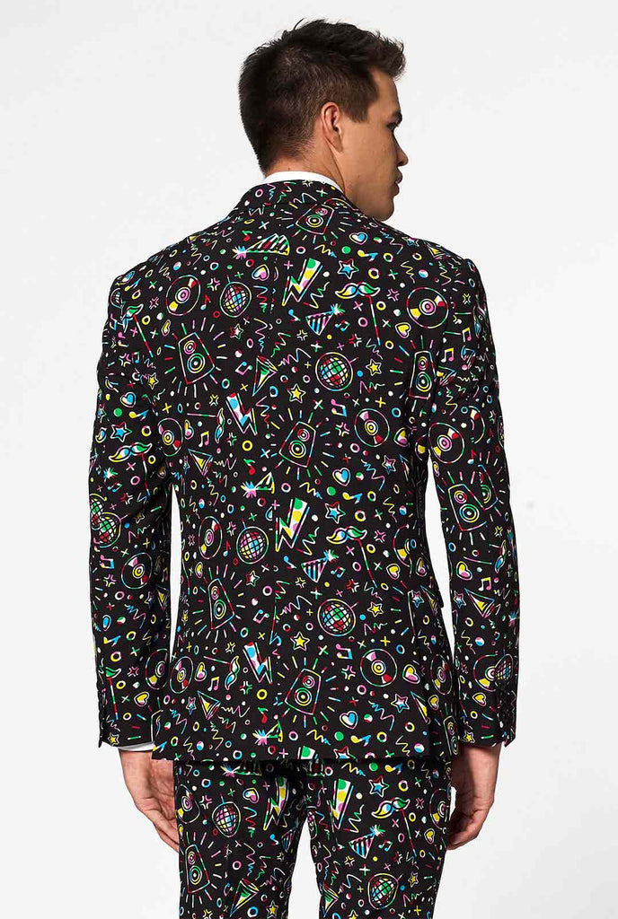 Funny Carnaval suit Disco Dude worn by man looking inside jacket