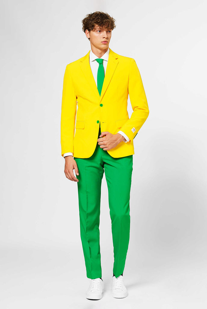 Man wearing green and yellow suit