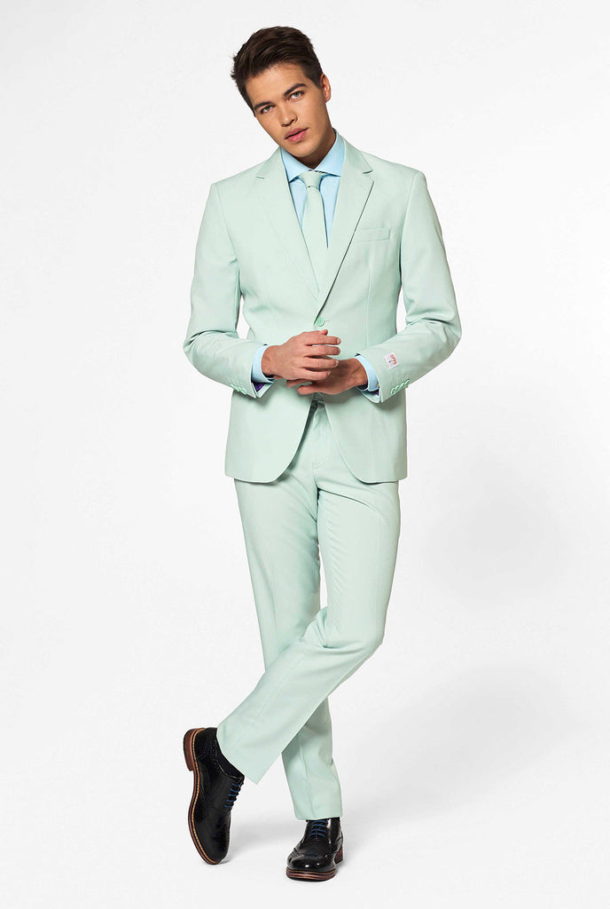 Man wearing pastel mint green colored men's suit