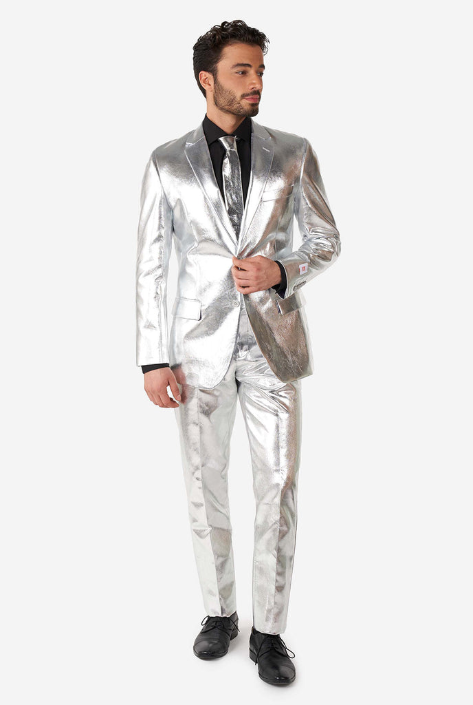 Man wearing shiny silver suit 