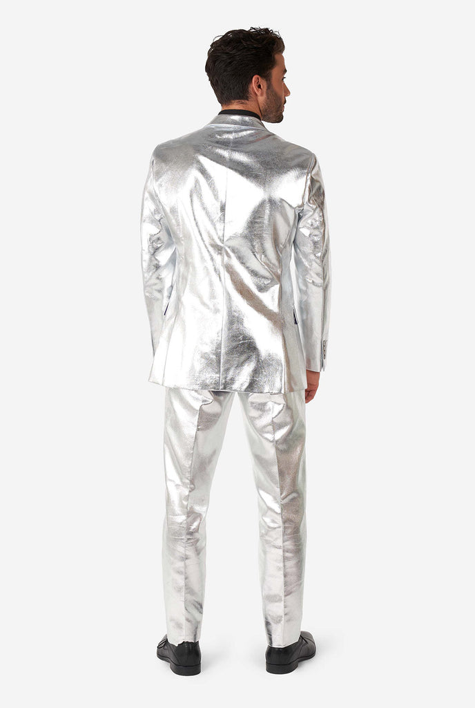 Man wearing shiny silver suit 