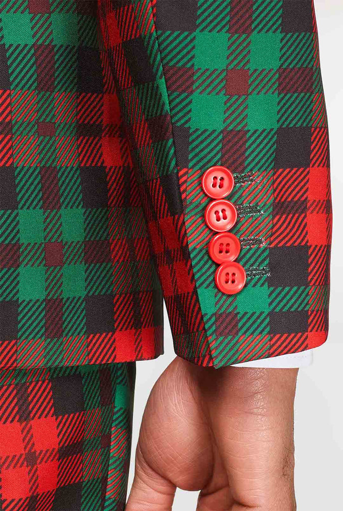 Green and red tartan Christmas suit worn by man