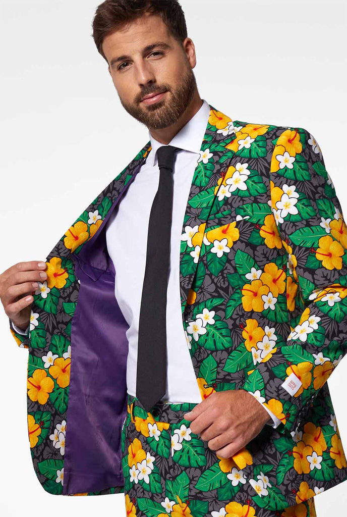 Man wearing men's suit with flower print
