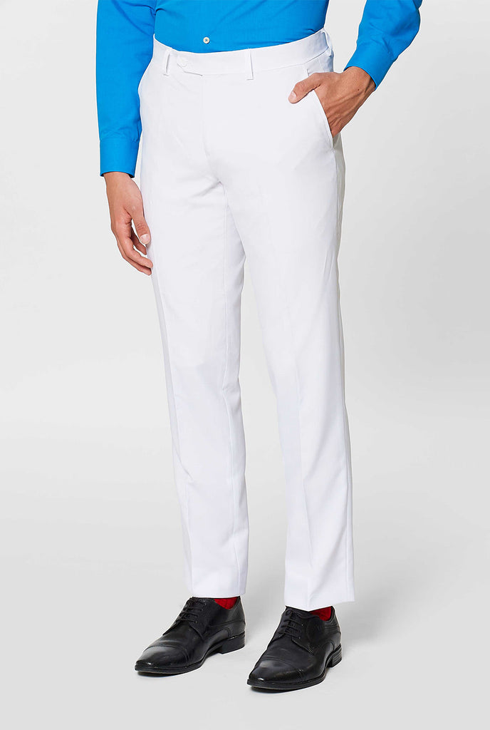 All white men's suit worn by man