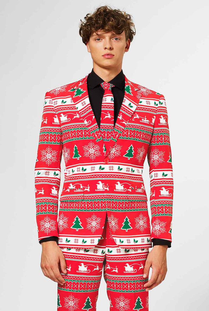 Man wearing red Christmas suit and black dress shirt