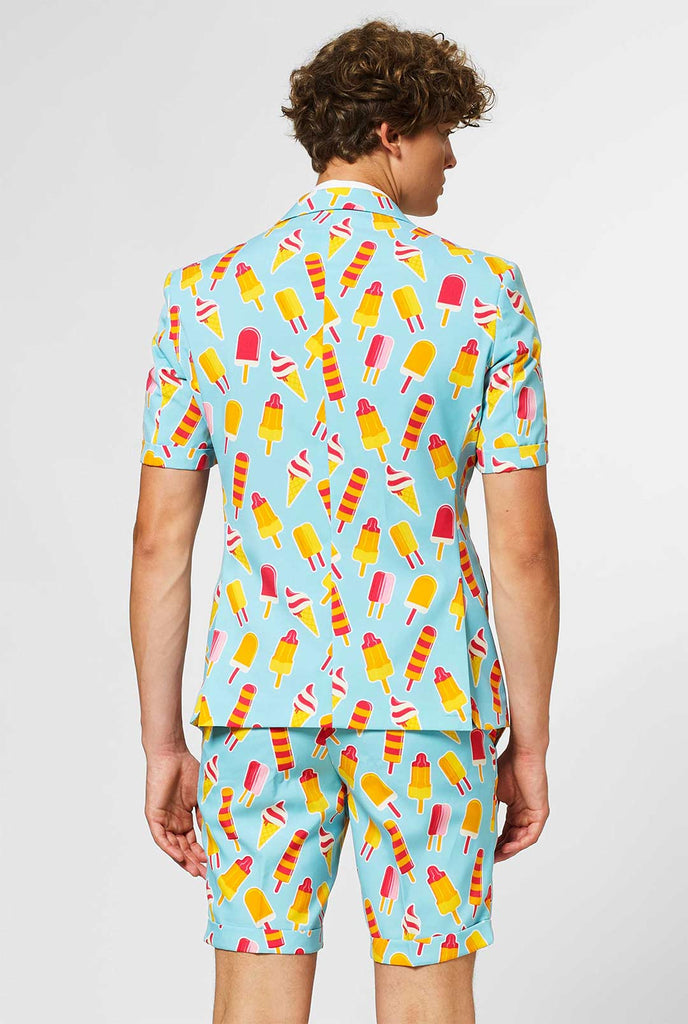 Man wearing light blue summer suit with popsicle print
