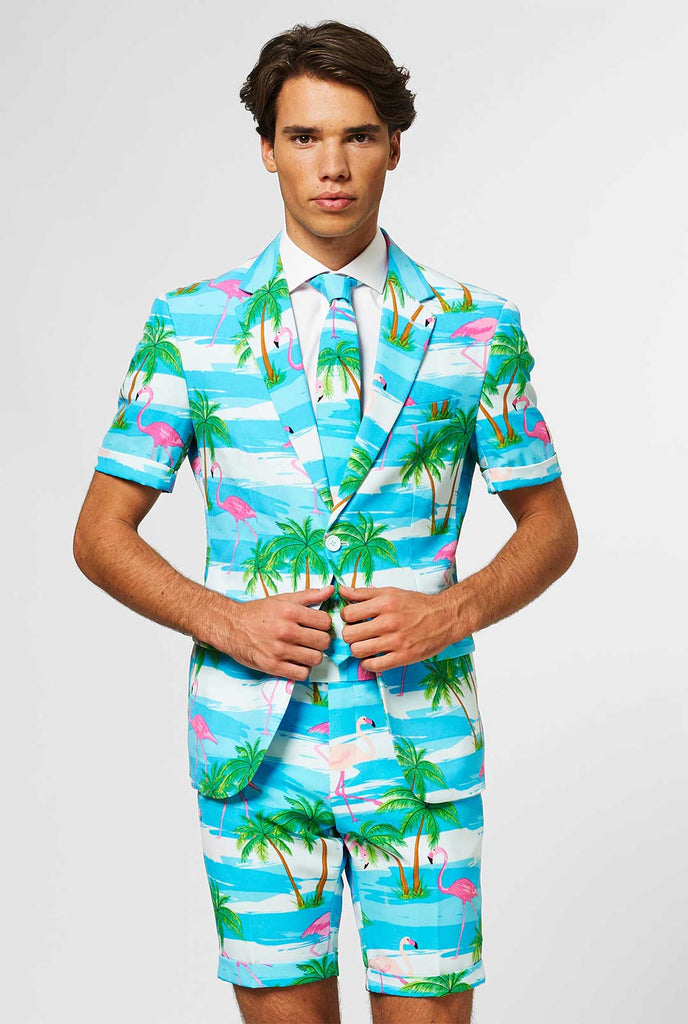 Man wearing summer suit with tropical flamingo print