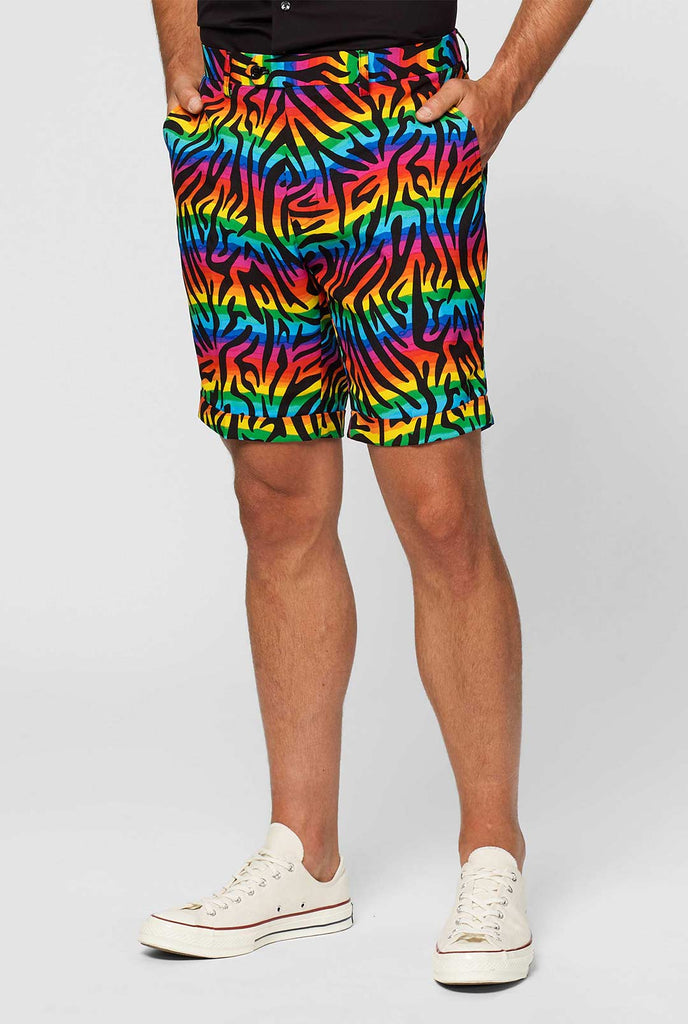 Man wearing summer suit with rainbow zebra stripes print