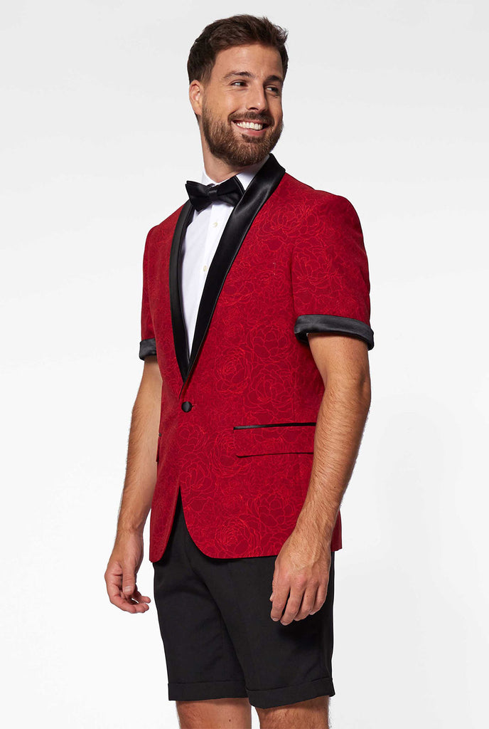 Man wearing red summer tuxedo with flower print